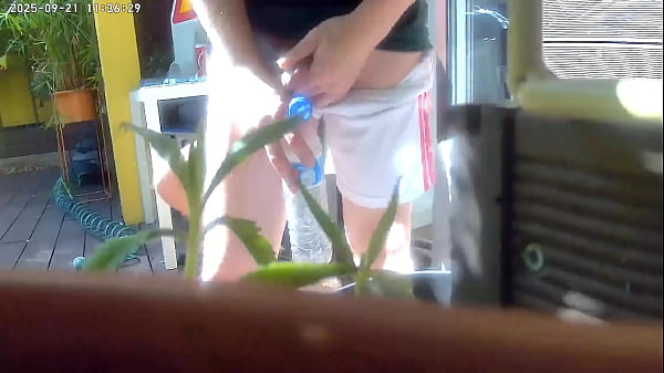 Redhead boy tries to pee in a bottle hiding from his friend. Caught, it ends up in watersports and a gay blowjob